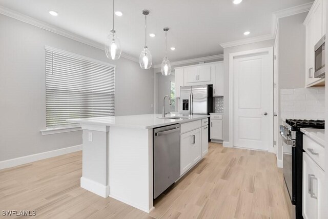 26930 Lark Ct, Punta Gorda, FL 33955 - kitchen with appliances with stainless steel finishes, a sink, backsplash, recessed lighting, and light countertops