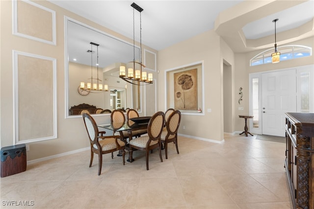 tiled dining room with a wealth of natural light