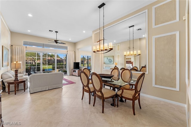 dining space with ceiling fan and light tile patterned floors