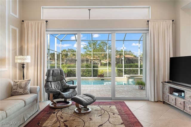 entryway featuring light tile patterned flooring and plenty of natural light