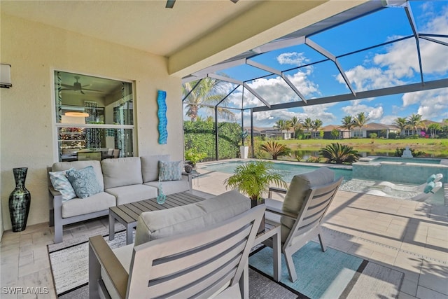 view of patio featuring a pool with hot tub, an outdoor living space, and a lanai