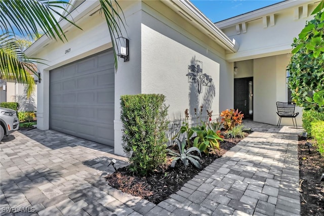 property entrance with a garage