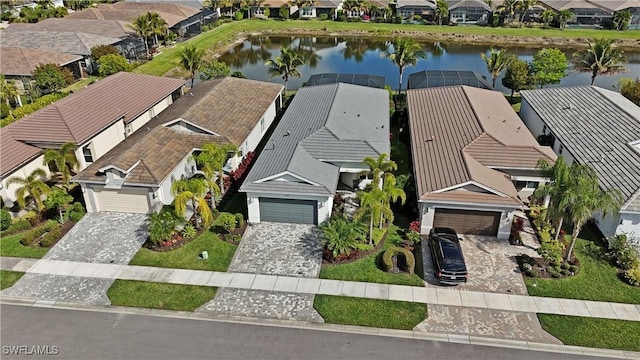 drone / aerial view with a water view