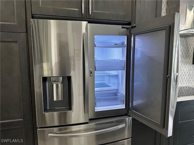 kitchen with stainless steel refrigerator with ice dispenser