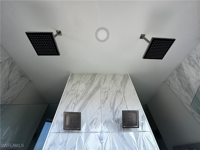 interior space featuring walk in shower