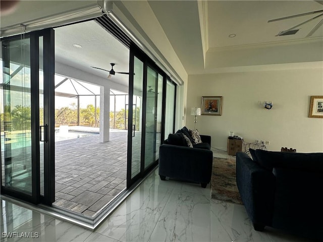 doorway featuring a raised ceiling