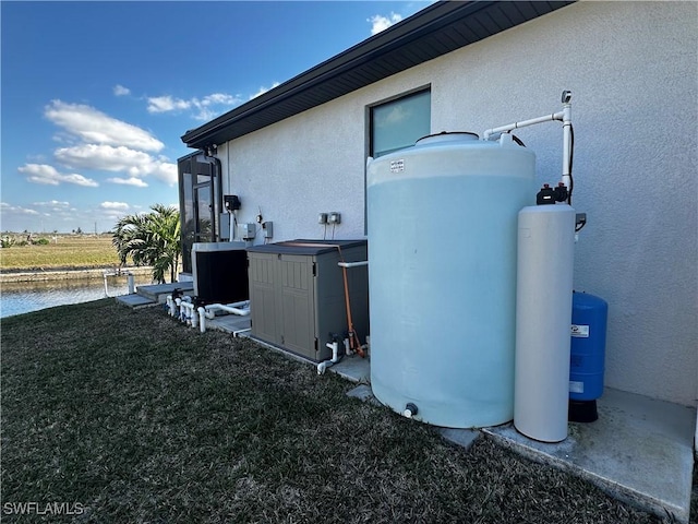 view of property exterior with a yard