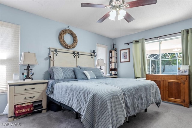 bedroom featuring ceiling fan and carpet flooring