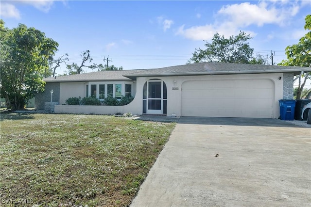 ranch-style house with a garage and a front yard