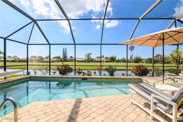 outdoor pool featuring a lanai, a patio area, and a water view