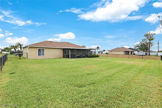 view of yard with a sunroom