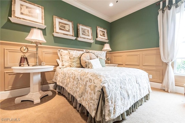 bedroom with crown molding and light carpet