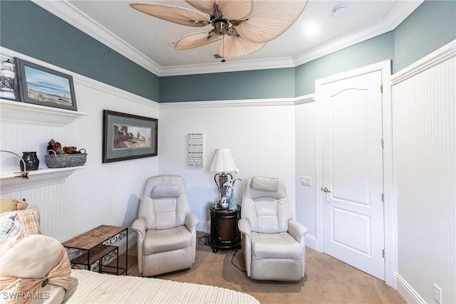 bedroom featuring light carpet, ornamental molding, and ceiling fan