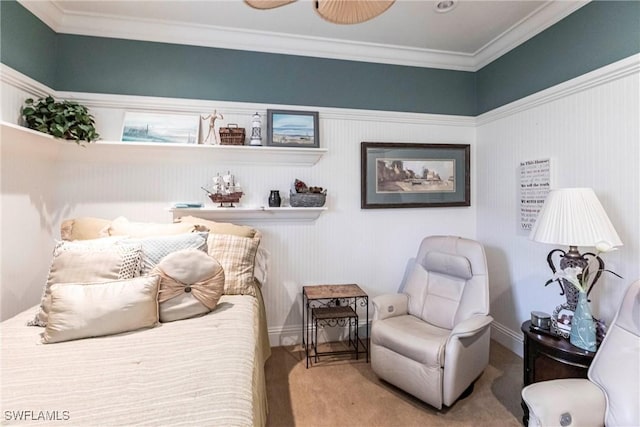 bedroom featuring ornamental molding and carpet