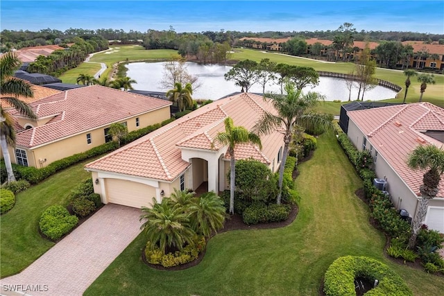 birds eye view of property with a water view