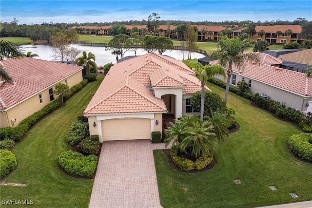 drone / aerial view featuring a water view