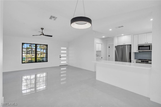 unfurnished living room featuring ceiling fan