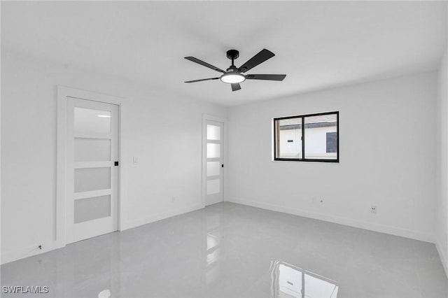 spare room featuring ceiling fan