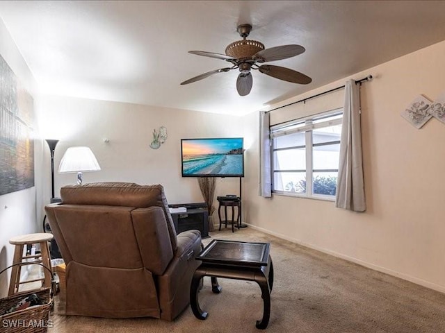 living room with ceiling fan and light carpet