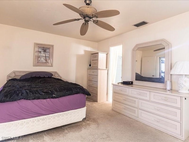 bedroom with light carpet and ceiling fan