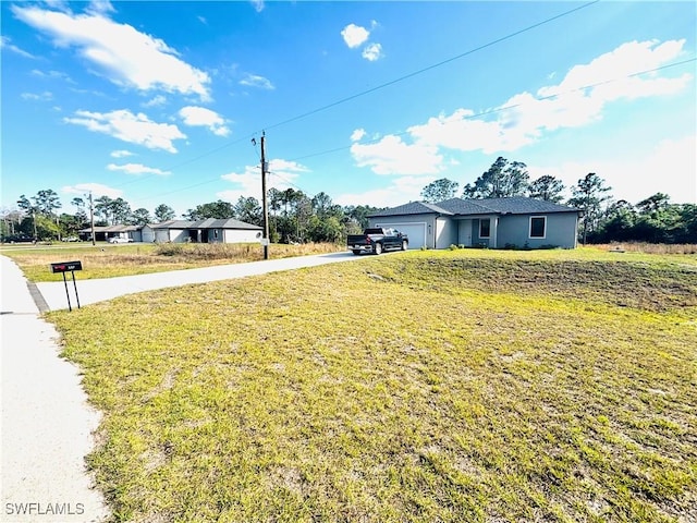 view of yard with a garage