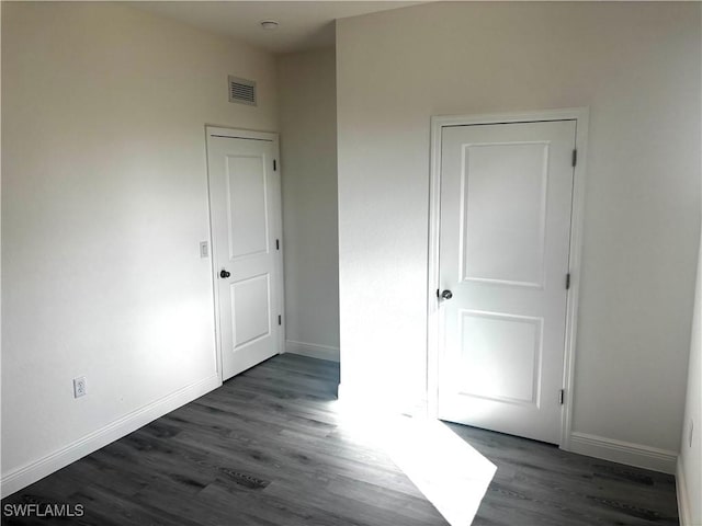 interior space featuring dark wood-type flooring