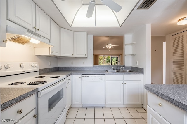 kitchen with white cabinetry, sink, white appliances, and ceiling fan