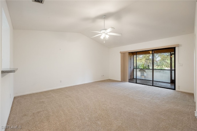 unfurnished room with ceiling fan, vaulted ceiling, and light carpet