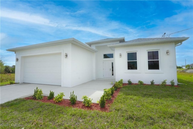 ranch-style house with a front yard and a garage