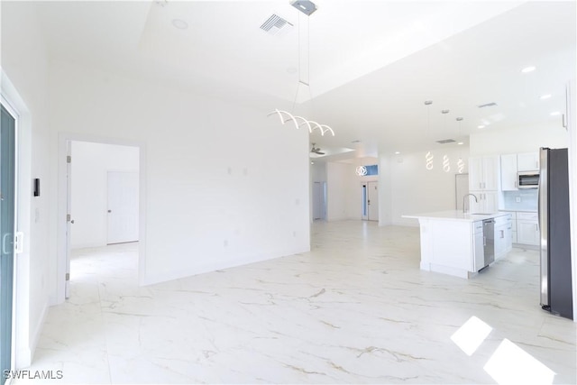 interior space featuring sink and appliances with stainless steel finishes