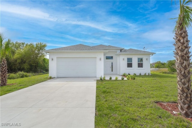 view of front facade featuring a garage and a front yard