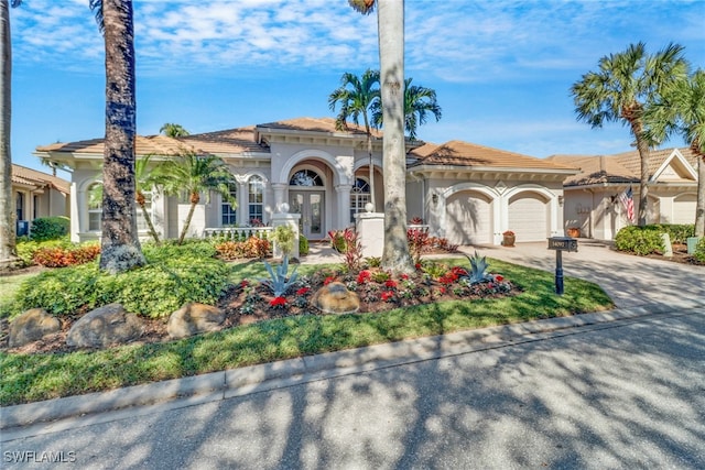 view of front of property with a garage