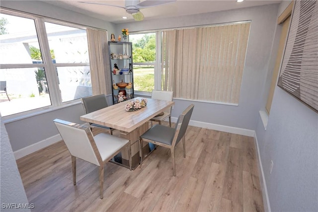 dining room featuring recessed lighting, baseboards, a ceiling fan, and wood finished floors