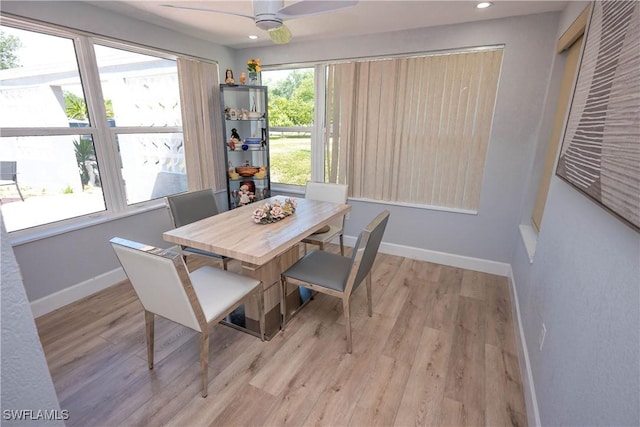dining area featuring light wood-type flooring, baseboards, a ceiling fan, and recessed lighting