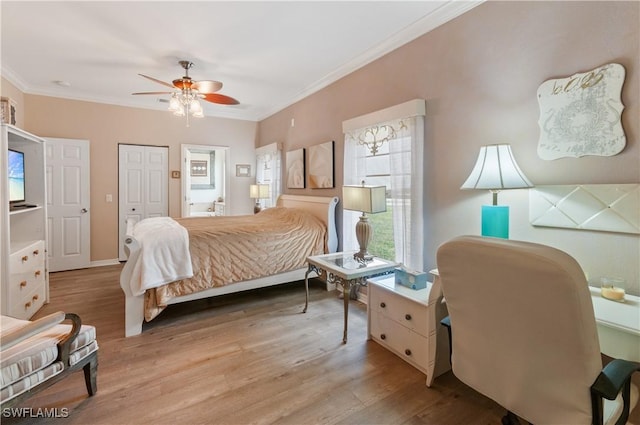 bedroom with ceiling fan, ornamental molding, and light hardwood / wood-style flooring