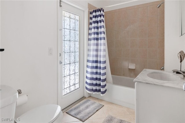 full bathroom featuring shower / bath combo, toilet, tile patterned floors, and vanity