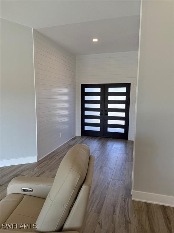 entrance foyer with wood-type flooring and french doors