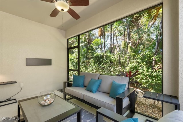 sunroom / solarium with ceiling fan