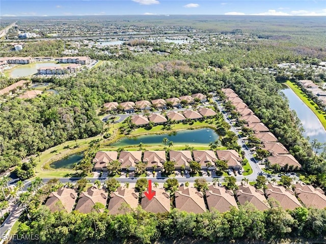 bird's eye view with a water view