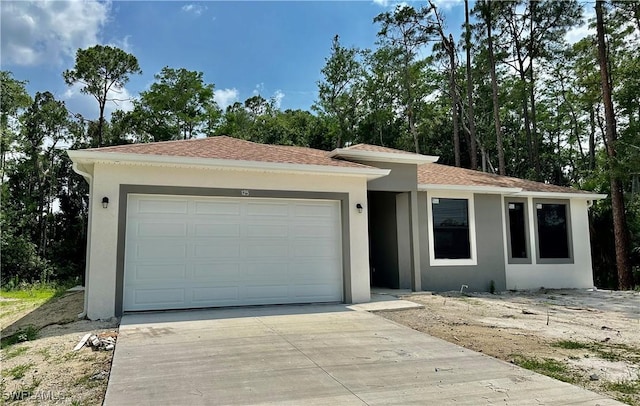 view of front of property with a garage