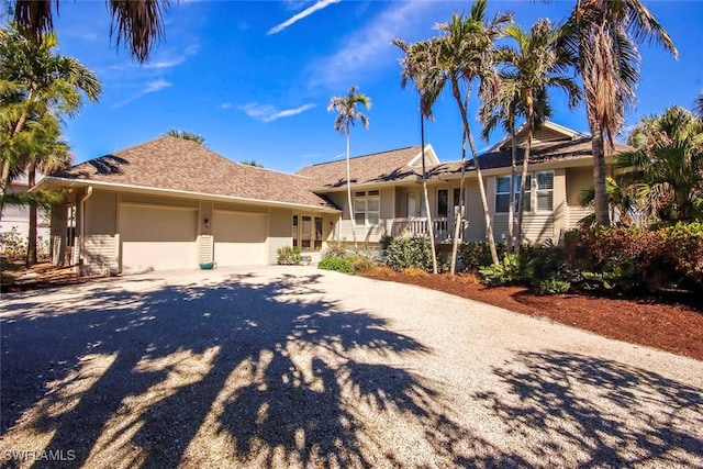 single story home featuring a garage