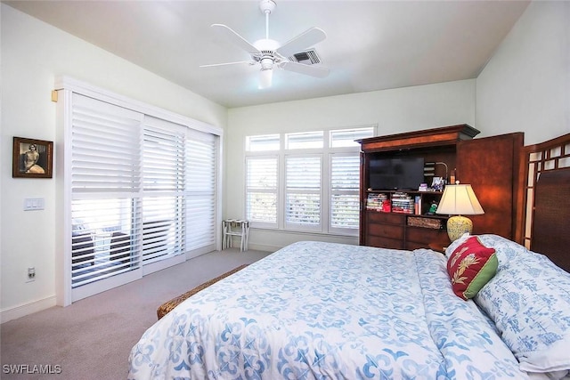 bedroom with carpet flooring, access to exterior, and ceiling fan