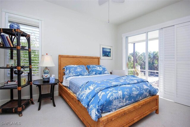 bedroom featuring carpet floors and access to outside