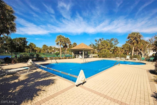 view of pool with a gazebo and a patio area