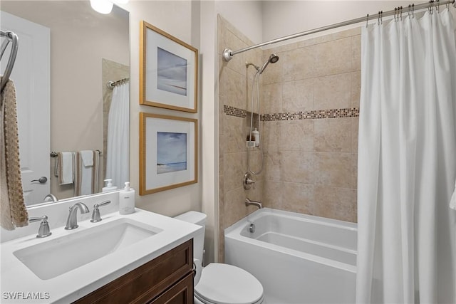 full bathroom with vanity, shower / bath combination with curtain, and toilet