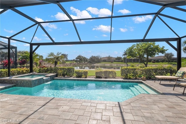 view of pool with an in ground hot tub, pool water feature, a lanai, a water view, and a patio area