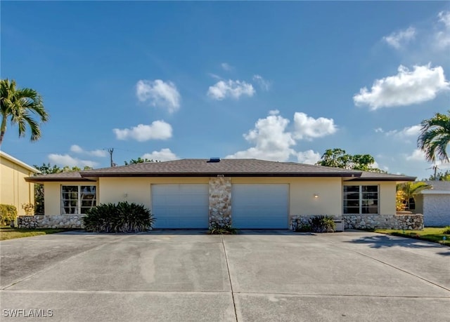 view of front of property featuring a garage