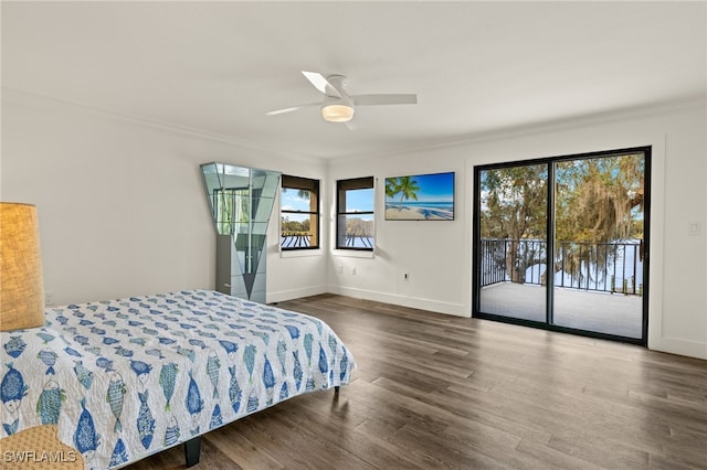 bedroom with access to exterior, crown molding, dark hardwood / wood-style floors, and ceiling fan