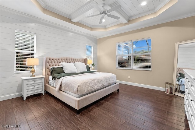 bedroom featuring multiple windows, coffered ceiling, dark wood-type flooring, and crown molding