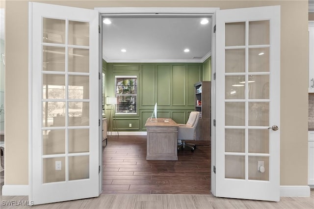 office featuring french doors and crown molding